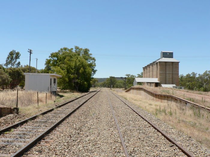 The view looking east, showing the platform (far left), safeworking hut, gantry crane, loading bank and silos.