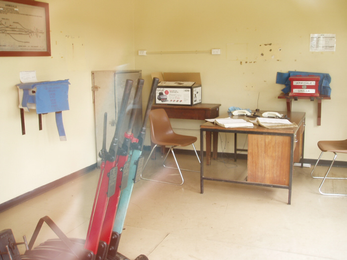 The safeworking equipment at Armidale Station. It includes a 6 lever frame, phones to contact Train Control, and two Train Staff Ticket boxes, with only the Armidale - Uralla box in use.