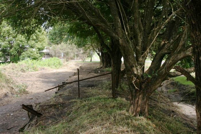 The view looking along the partly clear platform remains towards the end of the line.