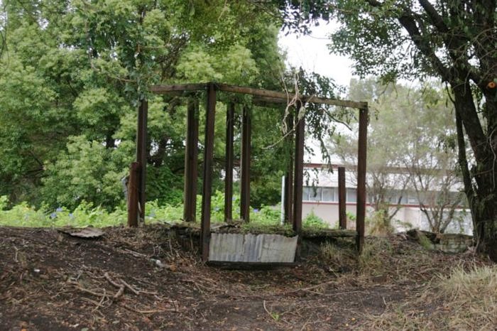 Only the framework remains of a shelter on the platform.