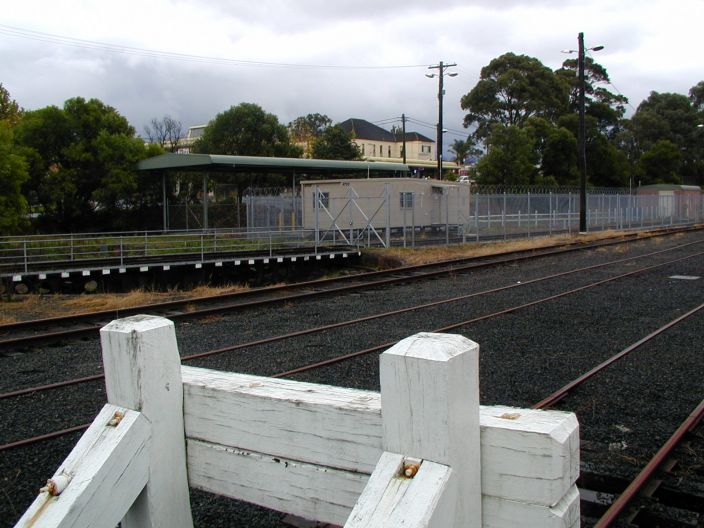 The turntable is still in place.  The buffers in the foreground mark the
end of the dairy siding.  The area beyond the turntable is used to stable
rolling stock, and was the one-time location of the engine shed, water tank
and ash pit.
