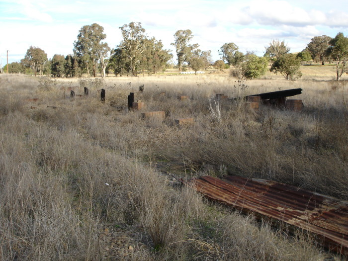 The remains of some structures in the yard.