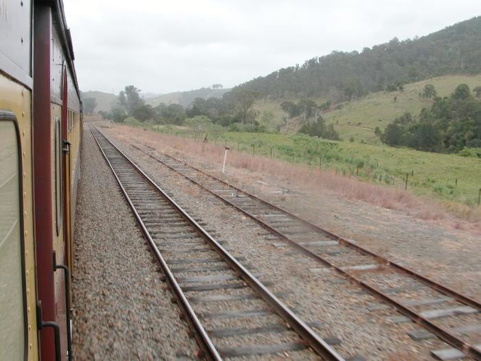 The view looking south towards the loop and goods siding. The one-time station was situated on the other side of the train.