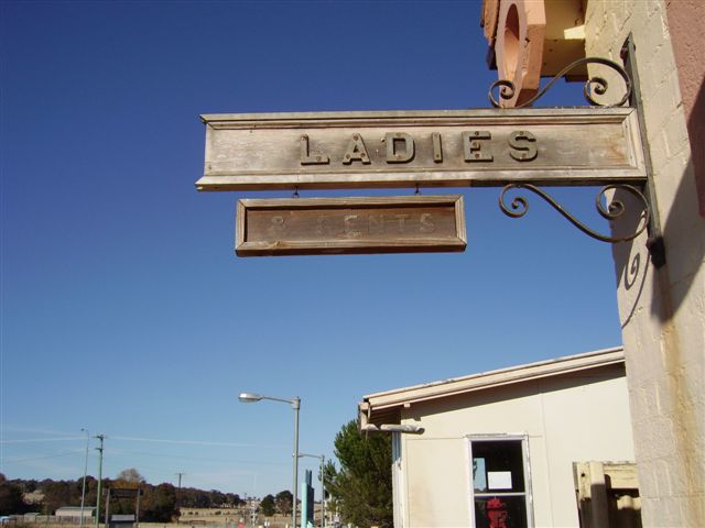 The old signs for the toilets.