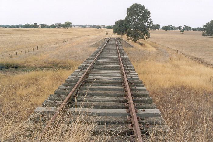 The view of the trestle decking from the western abutment looking east towards Walla Walla.