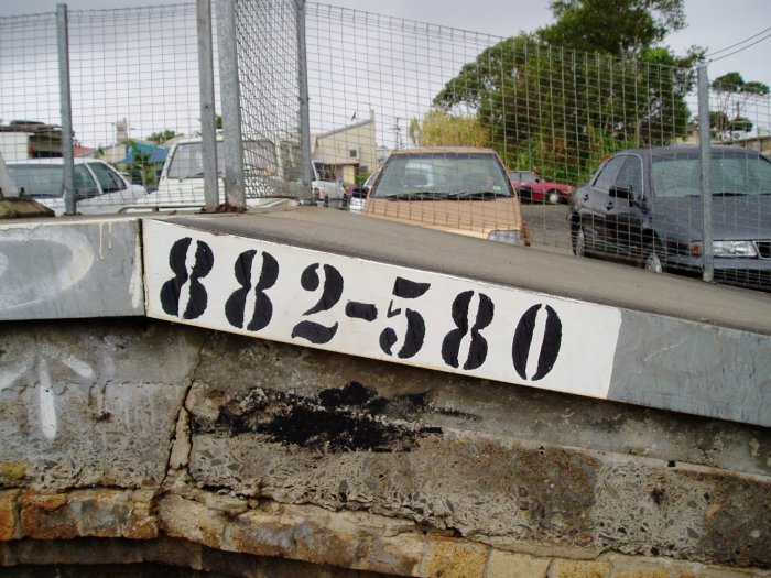 The distance marker at the up end of the platform.