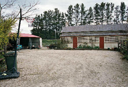 
The location of the station is now private property, but the station
building is still present.  The main line is behind the building.
