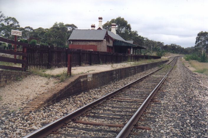 
Another shot looking up the line, showing the fenced off station area.
