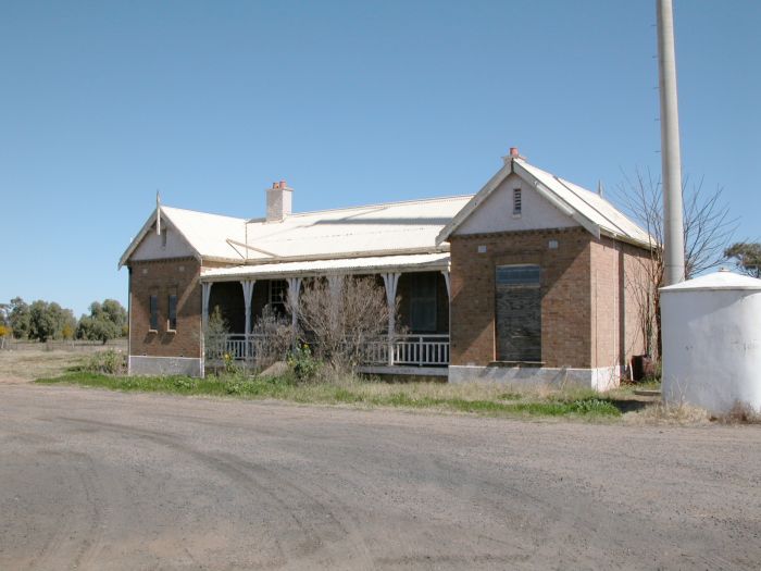 
The road-side approach to the boarded up station building.
