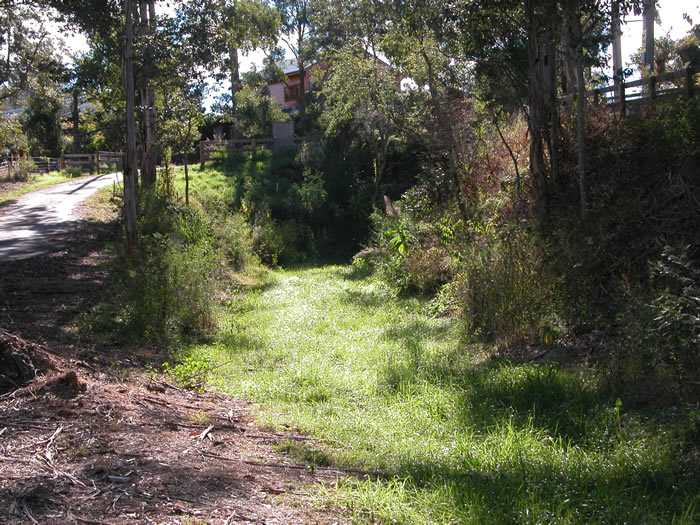 Between Duffys and Kurrajong the line passed through a cutting and under Gregg Rd. The bridge has been removed and the cutting under the road filled in.