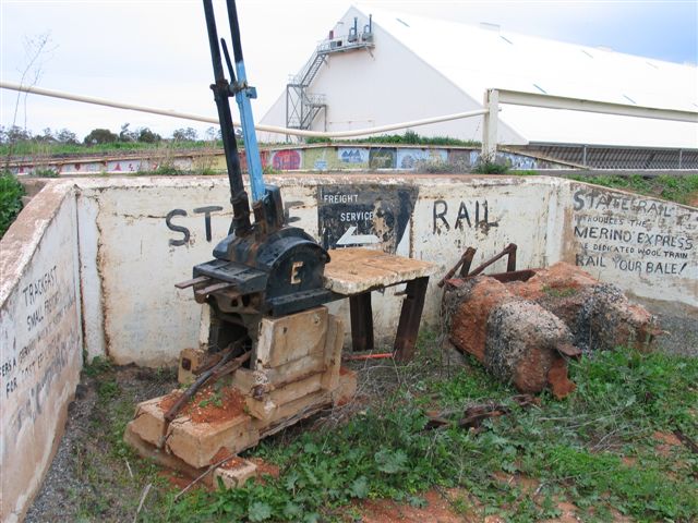 A removed lever frame sits in the old truck loading dock.