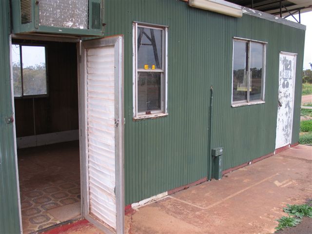 The signal box is now vandalised and dilapidated.