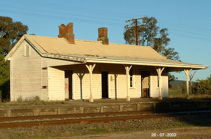 
The late afternoon sun catches the abandoned Gerogery station, with one of
its chimneys crumbling.
