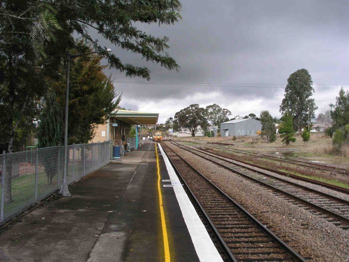 
The view looking up the platform, with an NR locomotive approaching.
