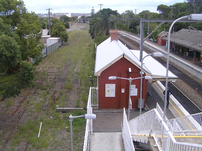 
The old goods sidings on the north side of the station.  One track
continued under the bridge in the distance before curving to the left
as the Wickham branch.
