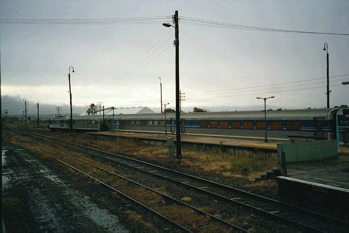 
An XPT has stopped briefly under dark skies, before continuing its
journey to Sydney.
