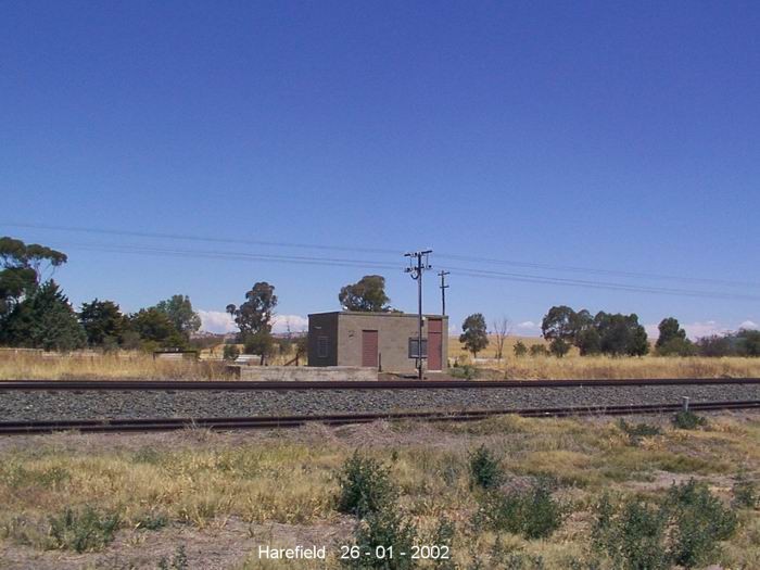 
A modern signalling hut with some unidentified foundations in front
of it.
