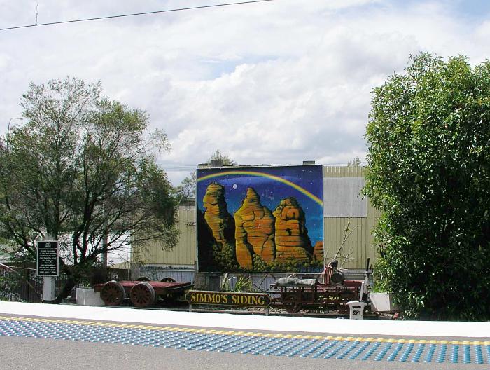 
On the north side of the station is a collection of equipment, with a
sign "Simmo's Siding".
