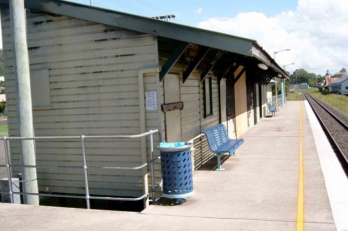 
The view looking in the up direction showing the boarded-up station
building which was damaged by fire earlier in the month.
The old Norco building can be seen in the right distance.
