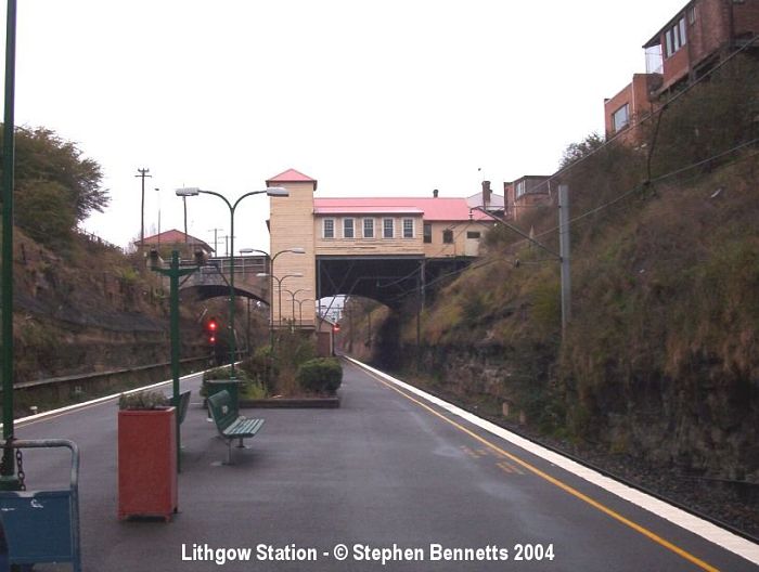 
The view looking down the platform towards the Sydney end of the station.
The photo shows the old goods lift and station buildings. The garden
in the centre of the platform was the base of the old stairs.
