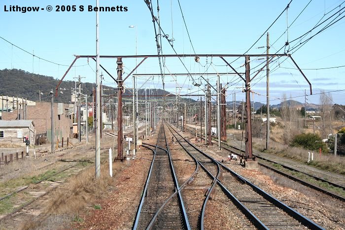 The view from a train looking towards Lithgow after coming through the bends down from Zig Zag.  At the end of the straight is Coal Stage Signal Box.