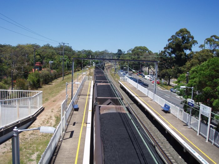 The view looking south as a Port Kembla-bound coal train passes through.