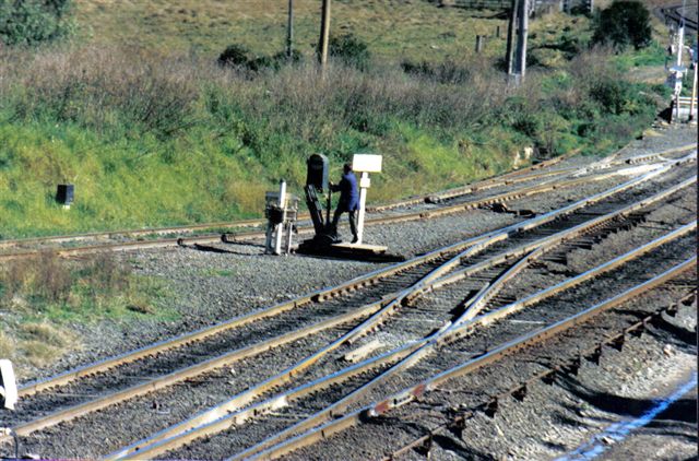 The train has entered the siding and cleared the main line, with the final setting of point to allow main line operations.