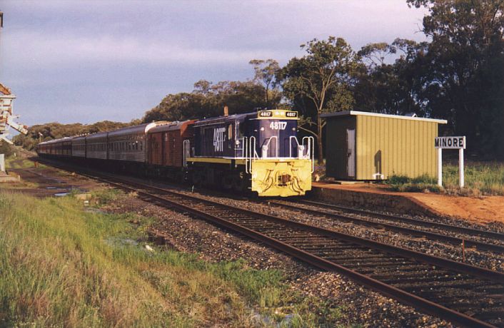 
48117 has paused in the late afternoon sun for safeworking duties at the
staff station of Minore.
