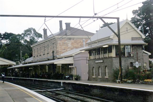 The view looking across to the two-storey station building and signal box.