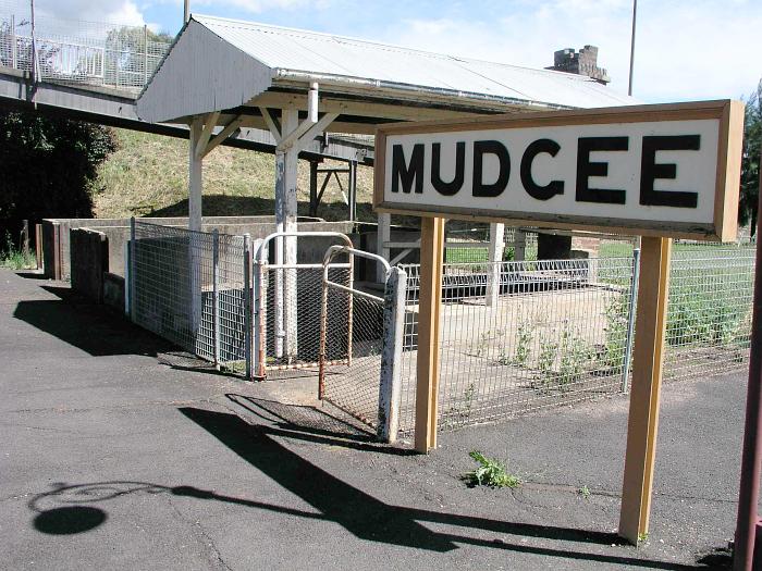 
The station signboard and remains of the old footwarmer ovens.
