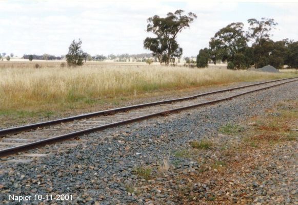 
The site of the one-time passenger platform.  Only a mound of dirt remains.
This is looking in the direction of The Rock.
