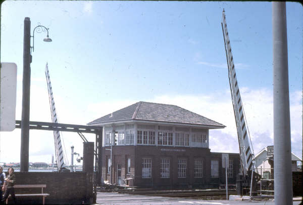 Market St level crossing controlled by Newcastle box, showing the gates open. When they closed they had a habit of bouncing.