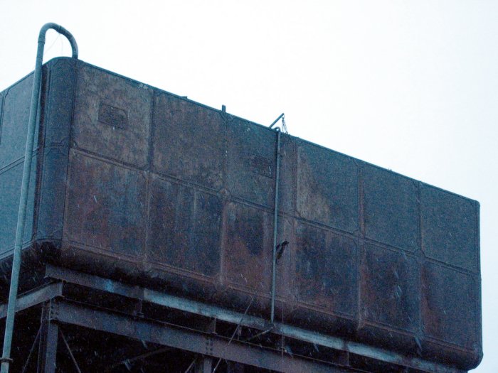 A closer view of the elevated water tank.