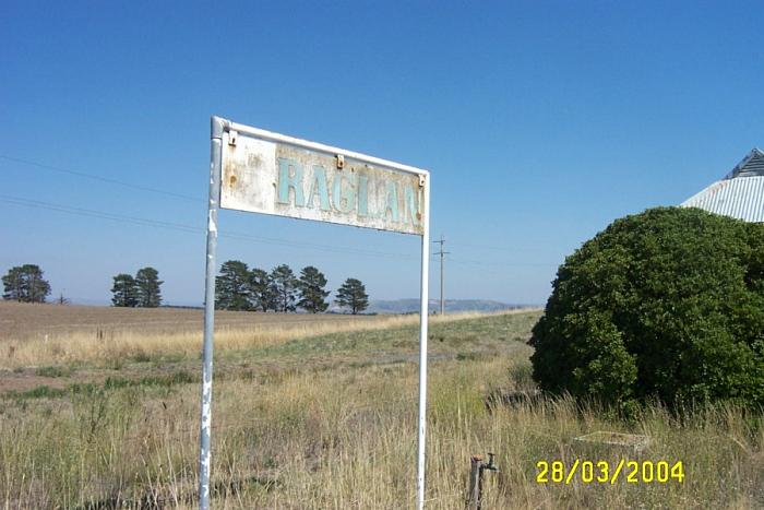 
The unusual faded metal name board on the platform.
