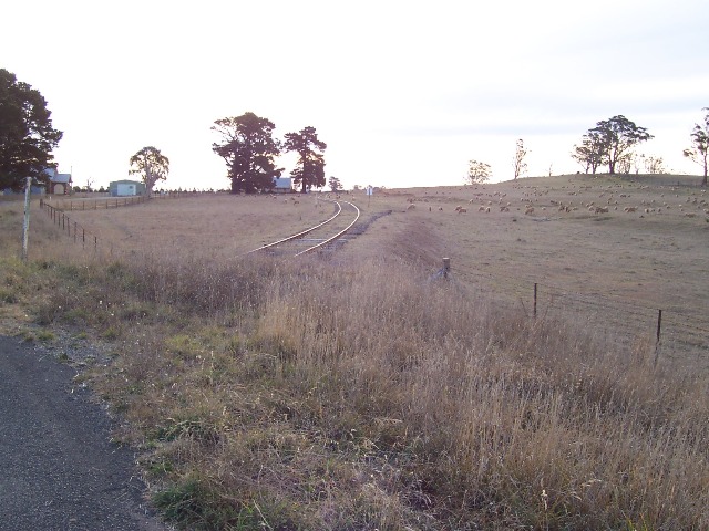 The view looking down the line towards Rosyln. The main line actually went straight ahead on the right of the present line. There is now a dog leg as the line wasn't re-aligned when the points were removed.