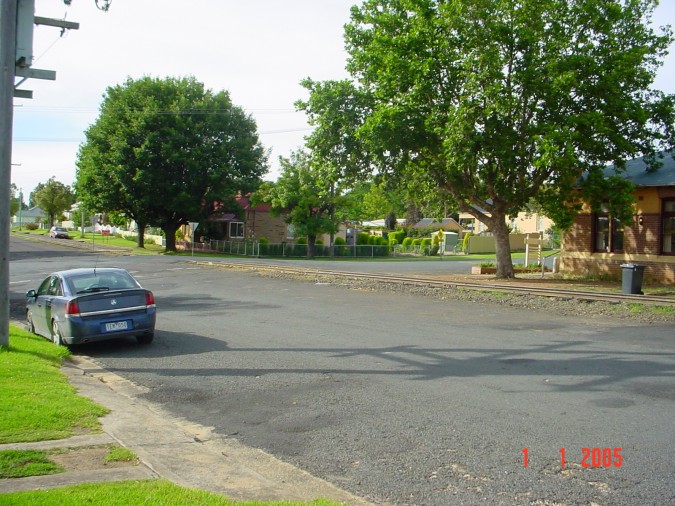 
The view looking across the Rossi Street crossing, in the general direction
of the end of the line.
