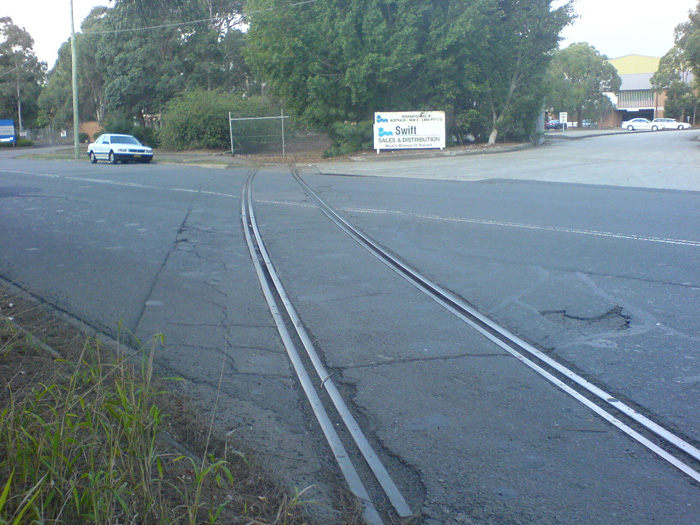 The view looking down the siding where it crosses Unwin Street.