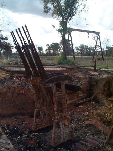 
The 6-lever frame is suspended among the ashes of the station building.
