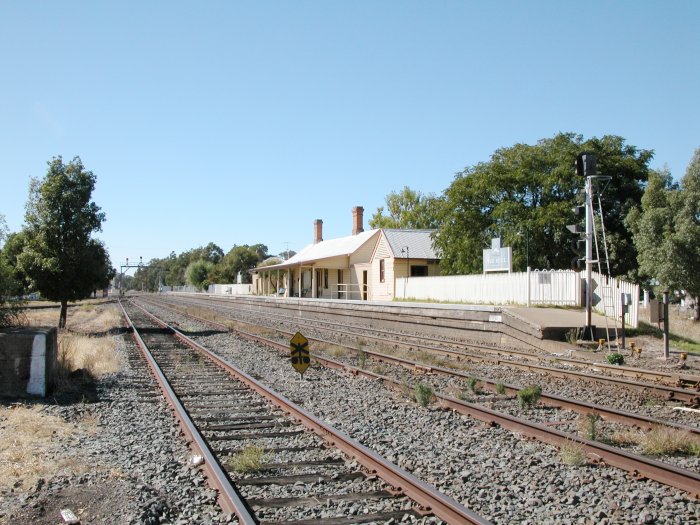 The view looning north along the station. Note the truncated crossing warning board - there are narrow clearances between the sidings at this location.