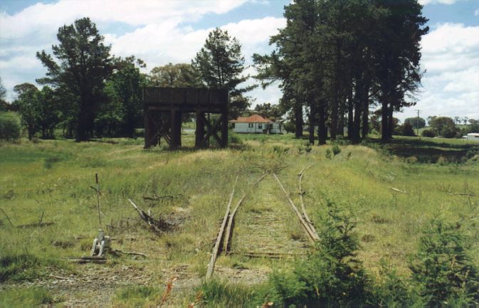 
The elevated water tank is still present in the remains of the yard.
