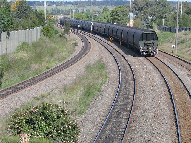 
The view looking up the line towards Newcastle at the tail end of a loaded
coal train.
