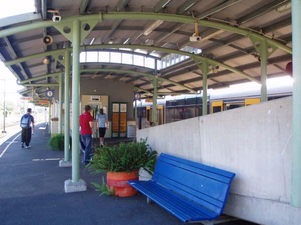 The ticket window at the base of the concrete passenger access ramp.