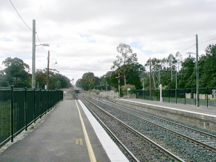 
The view from the up end of the station.  Note the semaphore is displaying
its "stop" aspect, as a freight train has just passed through.
