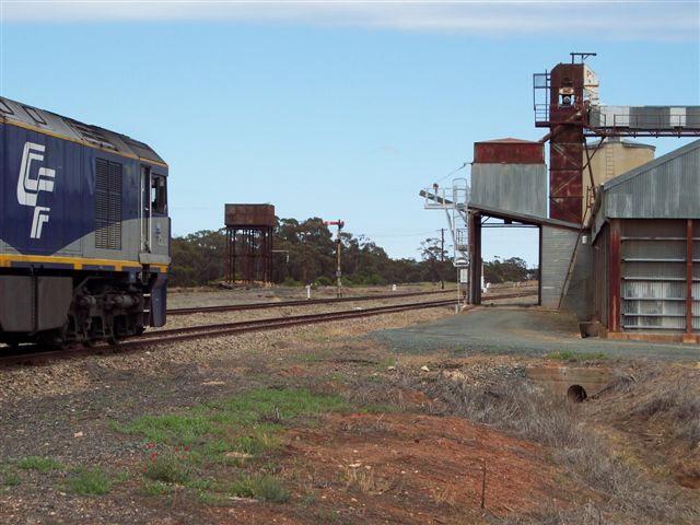 GL111 at the head of a train. The silos on the right and the concrete silo in the background are out of use.
