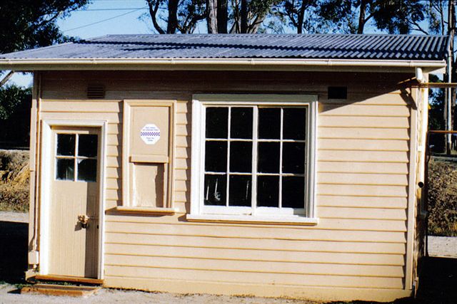 The front of the small signal box located on the up platform.